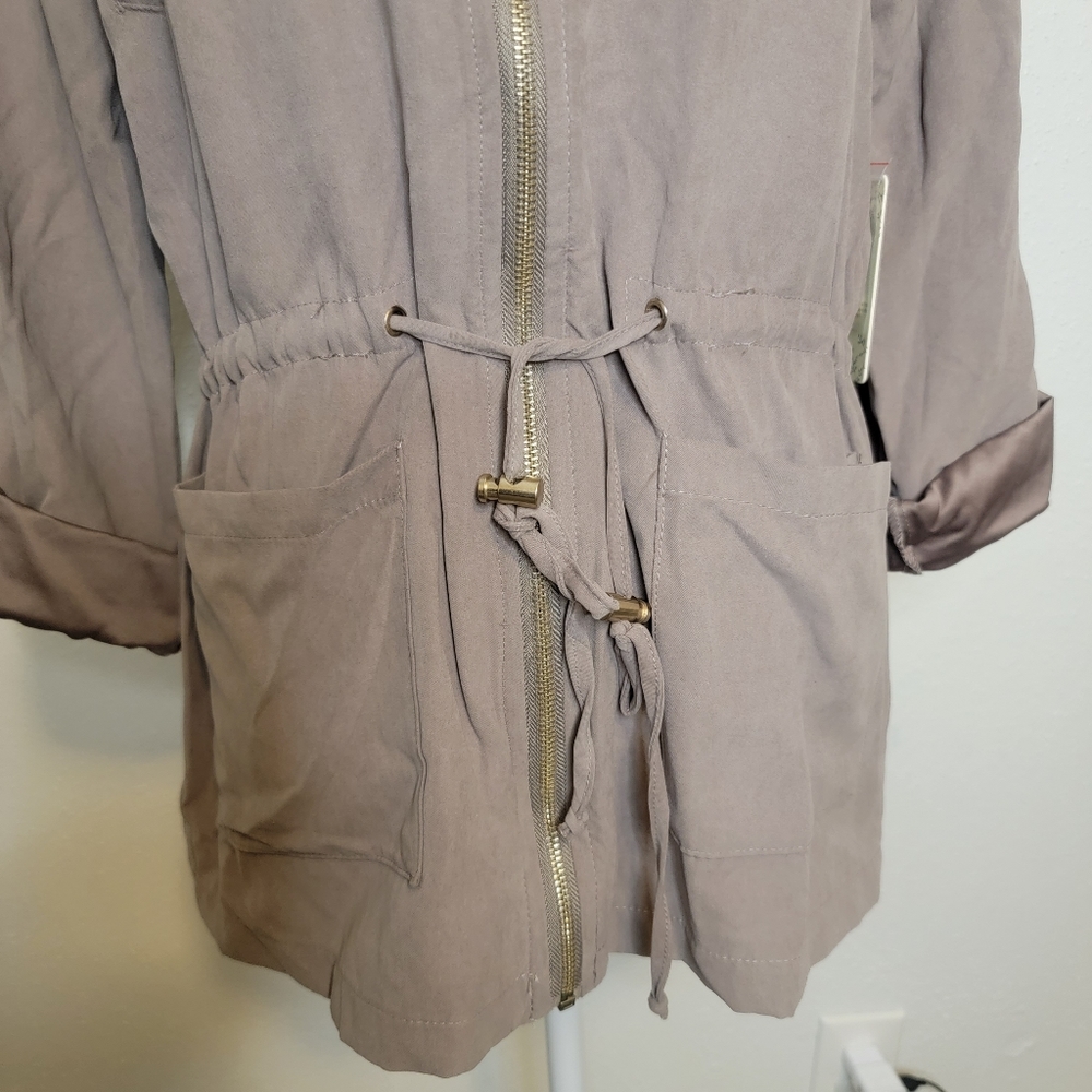 Light brown jacket. - Picture 7 of 13